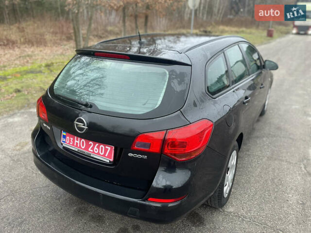 Черный Опель Астра, объемом двигателя 1.4 л и пробегом 210 тыс. км за 5900 $, фото 9 на Automoto.ua