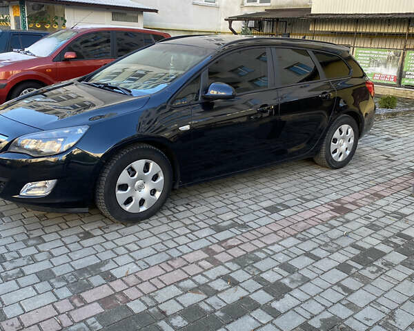 Черный Опель Астра, объемом двигателя 1.7 л и пробегом 260 тыс. км за 7500 $, фото 2 на Automoto.ua