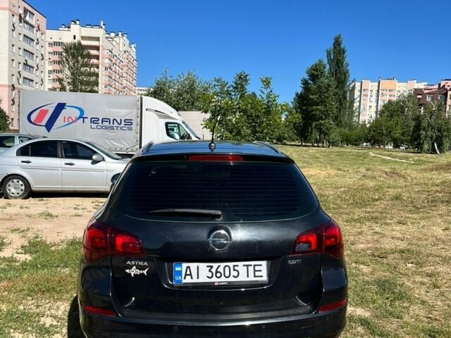 Черный Опель Астра, объемом двигателя 1.7 л и пробегом 231 тыс. км за 7200 $, фото 4 на Automoto.ua