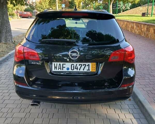 Черный Опель Астра, объемом двигателя 1.4 л и пробегом 167 тыс. км за 6800 $, фото 4 на Automoto.ua