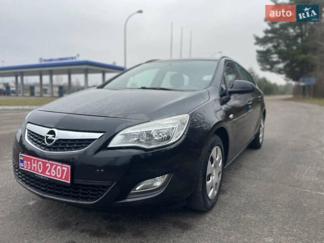 Черный Опель Астра, объемом двигателя 1.4 л и пробегом 210 тыс. км за 5900 $, фото 4 на Automoto.ua