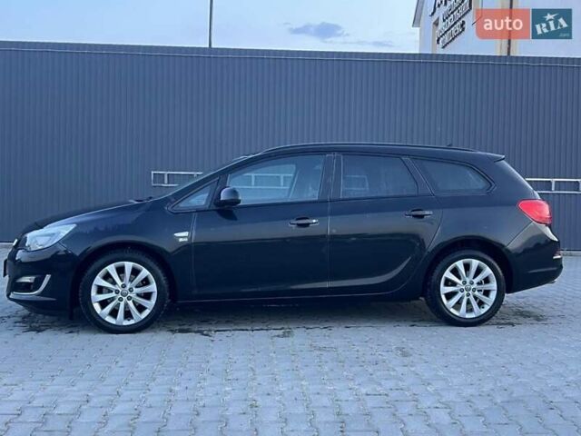Черный Опель Астра, объемом двигателя 1.4 л и пробегом 275 тыс. км за 7500 $, фото 2 на Automoto.ua