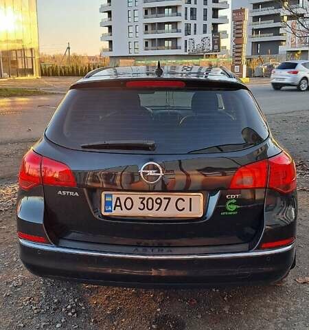Черный Опель Астра, объемом двигателя 1.7 л и пробегом 267 тыс. км за 7199 $, фото 10 на Automoto.ua