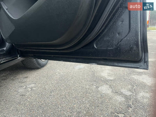 Черный Опель Астра, объемом двигателя 1.4 л и пробегом 210 тыс. км за 5900 $, фото 21 на Automoto.ua