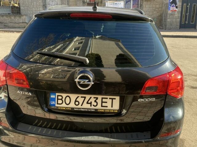 Черный Опель Астра, объемом двигателя 1.7 л и пробегом 260 тыс. км за 7500 $, фото 5 на Automoto.ua