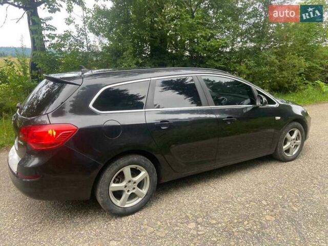 Черный Опель Астра, объемом двигателя 1.3 л и пробегом 284 тыс. км за 5950 $, фото 6 на Automoto.ua