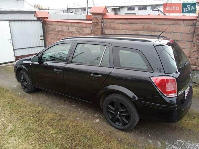 Черный Опель Астра, объемом двигателя 1.69 л и пробегом 260 тыс. км за 5600 $, фото 3 на Automoto.ua