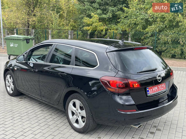 Черный Опель Астра, объемом двигателя 1.6 л и пробегом 125 тыс. км за 7450 $, фото 14 на Automoto.ua