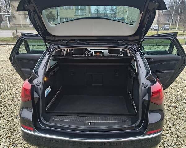 Черный Опель Астра, объемом двигателя 2 л и пробегом 175 тыс. км за 8300 $, фото 12 на Automoto.ua