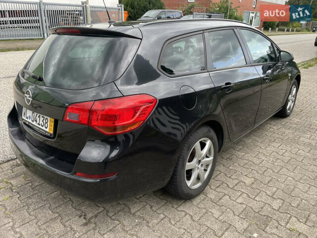 Черный Опель Астра, объемом двигателя 1.7 л и пробегом 230 тыс. км за 5950 $, фото 14 на Automoto.ua