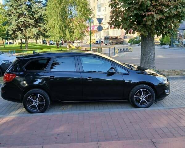 Черный Опель Астра, объемом двигателя 1.4 л и пробегом 167 тыс. км за 6800 $, фото 2 на Automoto.ua