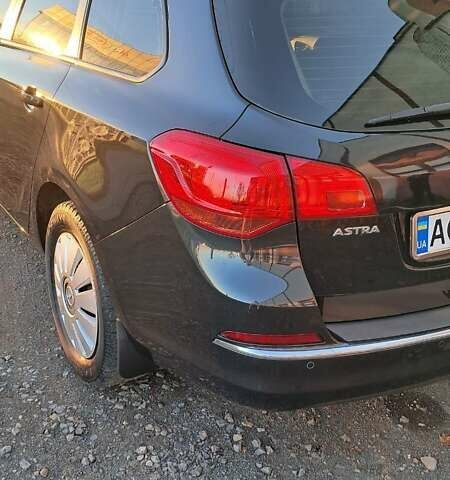 Черный Опель Астра, объемом двигателя 1.7 л и пробегом 267 тыс. км за 7199 $, фото 8 на Automoto.ua
