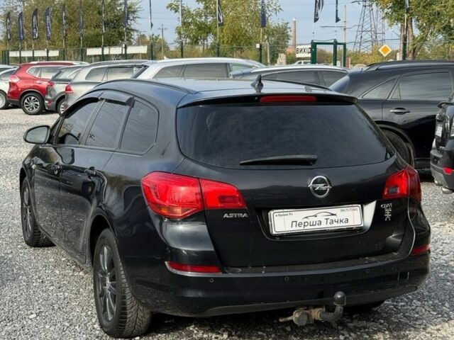 Черный Опель Астра, объемом двигателя 1.7 л и пробегом 212 тыс. км за 7000 $, фото 4 на Automoto.ua