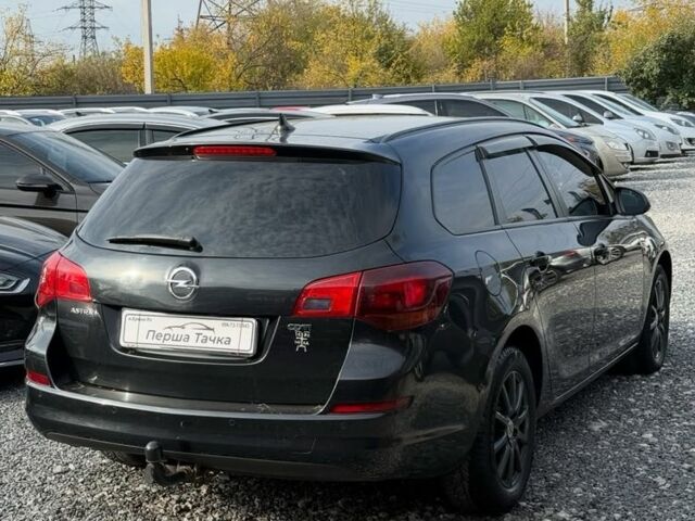 Черный Опель Астра, объемом двигателя 1.7 л и пробегом 212 тыс. км за 7000 $, фото 3 на Automoto.ua