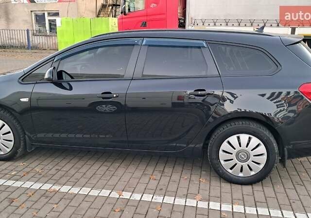 Черный Опель Астра, объемом двигателя 1.7 л и пробегом 267 тыс. км за 7199 $, фото 4 на Automoto.ua