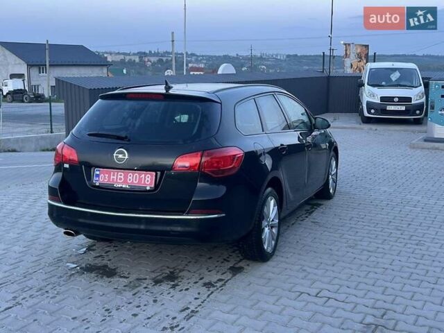 Черный Опель Астра, объемом двигателя 1.4 л и пробегом 275 тыс. км за 7500 $, фото 4 на Automoto.ua