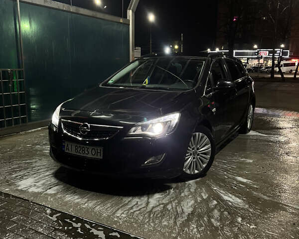 Черный Опель Астра, объемом двигателя 1.7 л и пробегом 275 тыс. км за 7400 $, фото 22 на Automoto.ua