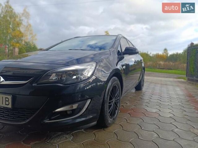 Черный Опель Астра, объемом двигателя 1.69 л и пробегом 230 тыс. км за 8000 $, фото 18 на Automoto.ua