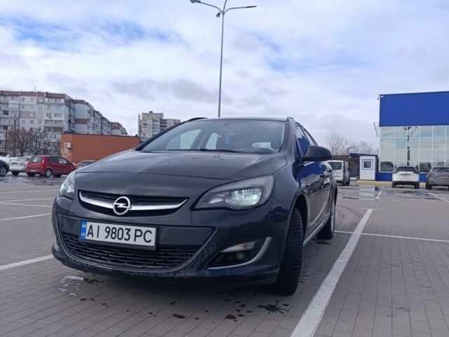 Черный Опель Астра, объемом двигателя 1.7 л и пробегом 272 тыс. км за 5950 $, фото 2 на Automoto.ua