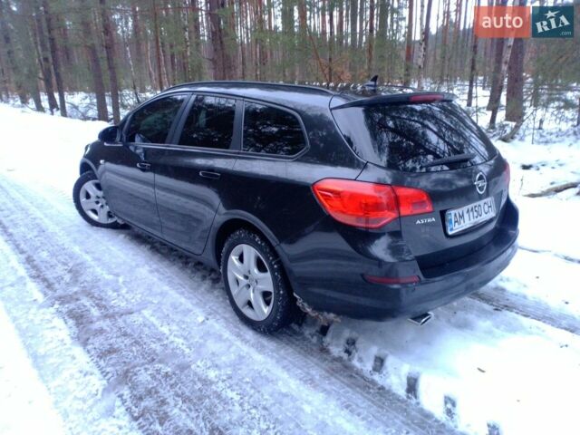 Черный Опель Астра, объемом двигателя 2 л и пробегом 263 тыс. км за 8800 $, фото 1 на Automoto.ua
