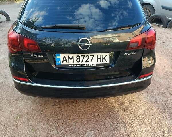 Черный Опель Астра, объемом двигателя 1.7 л и пробегом 250 тыс. км за 7200 $, фото 15 на Automoto.ua