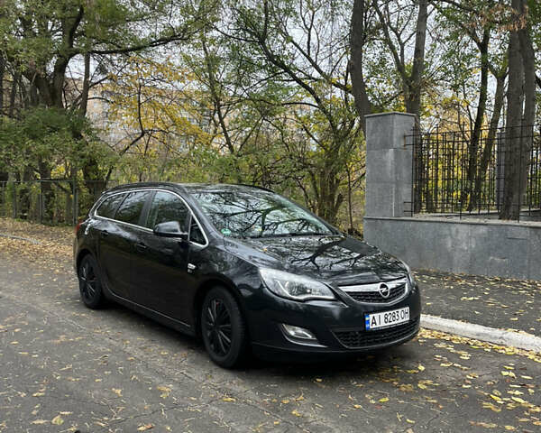 Черный Опель Астра, объемом двигателя 1.7 л и пробегом 275 тыс. км за 7400 $, фото 1 на Automoto.ua