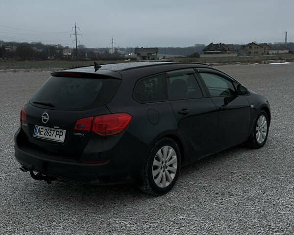 Чорний Опель Астра, об'ємом двигуна 1.4 л та пробігом 269 тис. км за 8400 $, фото 6 на Automoto.ua
