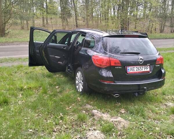 Черный Опель Астра, объемом двигателя 1.4 л и пробегом 242 тыс. км за 6800 $, фото 6 на Automoto.ua