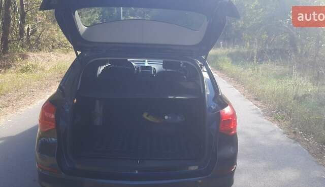 Черный Опель Астра, объемом двигателя 1.4 л и пробегом 274 тыс. км за 6899 $, фото 2 на Automoto.ua