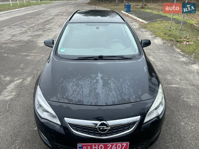 Черный Опель Астра, объемом двигателя 1.4 л и пробегом 210 тыс. км за 5900 $, фото 3 на Automoto.ua