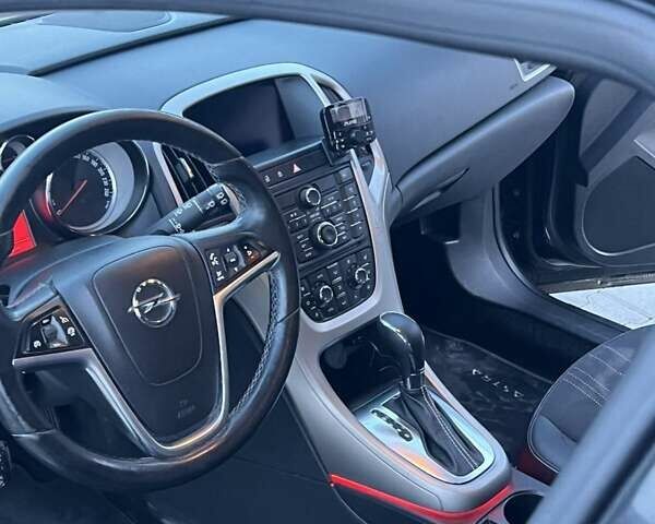 Черный Опель Астра, объемом двигателя 1.4 л и пробегом 275 тыс. км за 7500 $, фото 6 на Automoto.ua