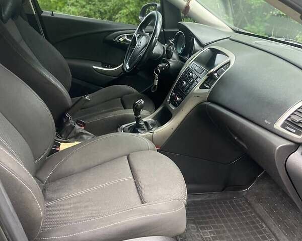 Черный Опель Астра, объемом двигателя 1.3 л и пробегом 284 тыс. км за 5950 $, фото 5 на Automoto.ua