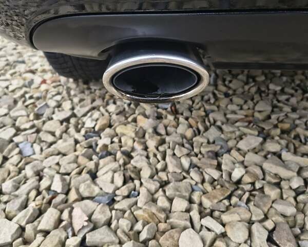 Черный Опель Астра, объемом двигателя 2 л и пробегом 175 тыс. км за 8300 $, фото 15 на Automoto.ua