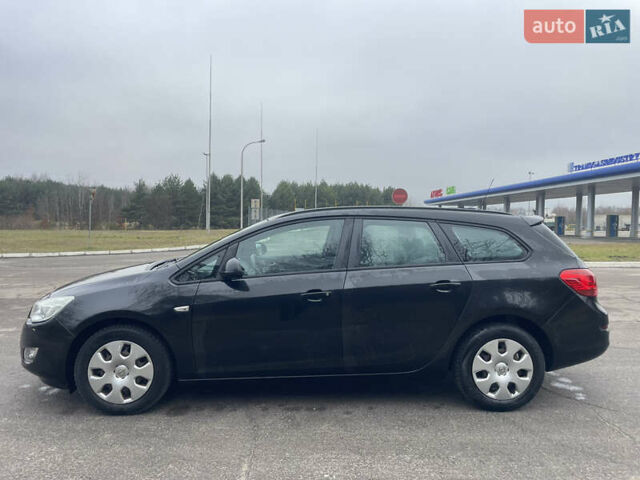 Черный Опель Астра, объемом двигателя 1.4 л и пробегом 210 тыс. км за 5900 $, фото 5 на Automoto.ua