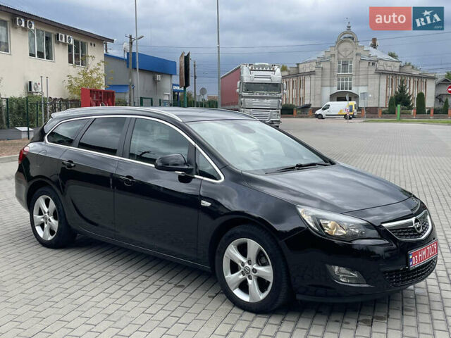 Черный Опель Астра, объемом двигателя 1.6 л и пробегом 125 тыс. км за 7450 $, фото 5 на Automoto.ua