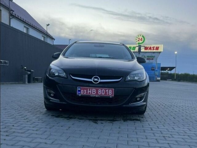 Черный Опель Астра, объемом двигателя 1.4 л и пробегом 275 тыс. км за 7500 $, фото 4 на Automoto.ua