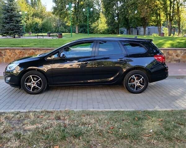 Черный Опель Астра, объемом двигателя 1.4 л и пробегом 167 тыс. км за 6800 $, фото 1 на Automoto.ua