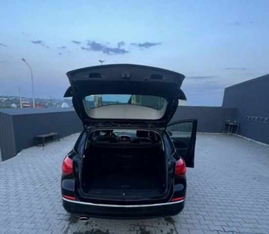 Черный Опель Астра, объемом двигателя 1.4 л и пробегом 275 тыс. км за 7500 $, фото 7 на Automoto.ua