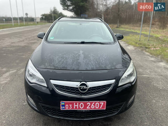 Черный Опель Астра, объемом двигателя 1.4 л и пробегом 210 тыс. км за 5900 $, фото 2 на Automoto.ua