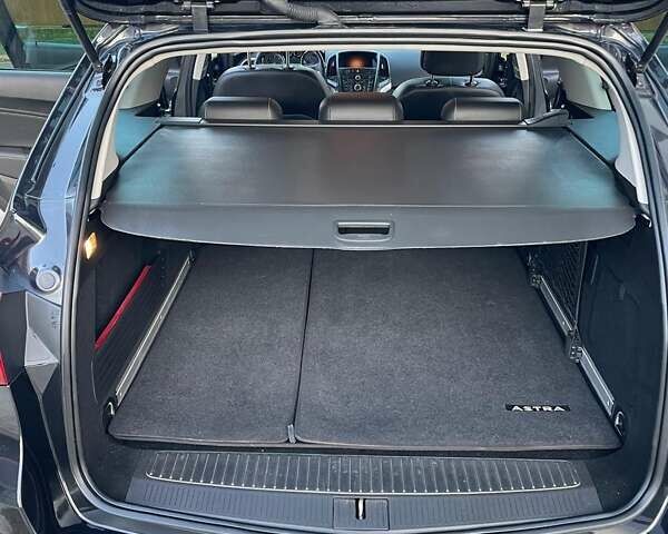 Черный Опель Астра, объемом двигателя 1.96 л и пробегом 210 тыс. км за 7800 $, фото 15 на Automoto.ua