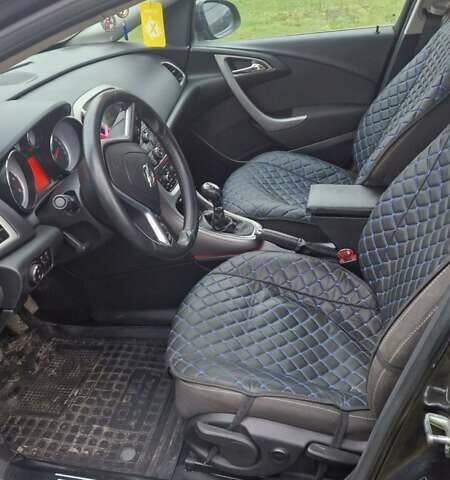 Черный Опель Астра, объемом двигателя 1.7 л и пробегом 200 тыс. км за 7200 $, фото 14 на Automoto.ua