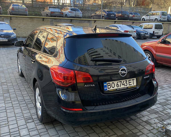 Черный Опель Астра, объемом двигателя 1.7 л и пробегом 260 тыс. км за 7500 $, фото 3 на Automoto.ua