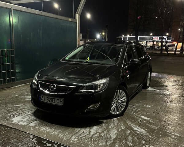 Черный Опель Астра, объемом двигателя 1.7 л и пробегом 275 тыс. км за 7400 $, фото 23 на Automoto.ua