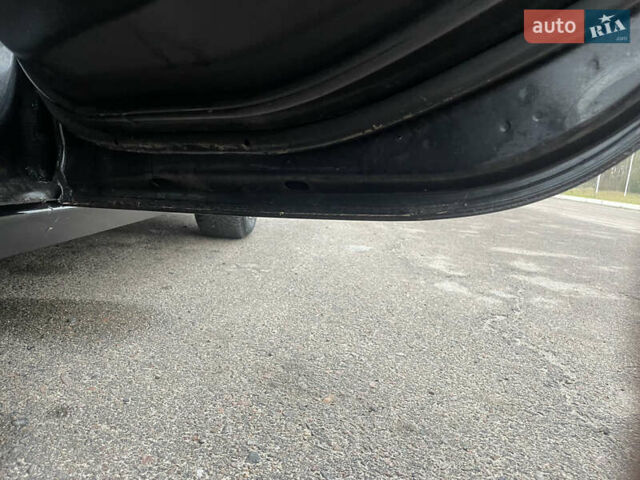 Черный Опель Астра, объемом двигателя 1.4 л и пробегом 210 тыс. км за 5900 $, фото 20 на Automoto.ua