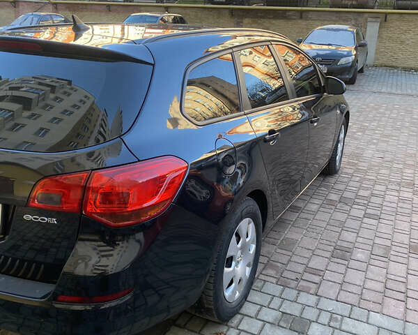 Черный Опель Астра, объемом двигателя 1.7 л и пробегом 260 тыс. км за 7500 $, фото 4 на Automoto.ua