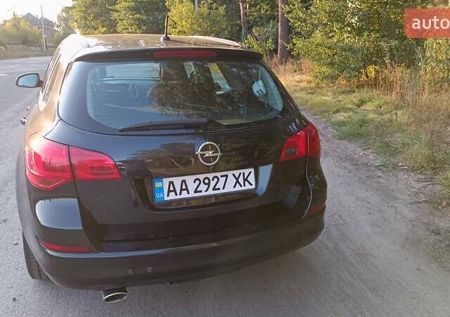 Черный Опель Астра, объемом двигателя 2 л и пробегом 308 тыс. км за 7400 $, фото 4 на Automoto.ua