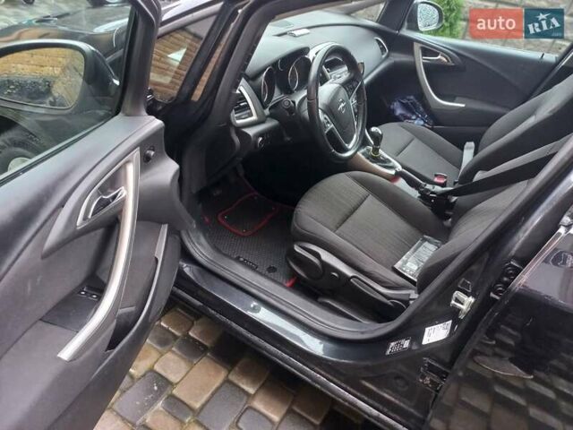 Черный Опель Астра, объемом двигателя 1.7 л и пробегом 185 тыс. км за 6650 $, фото 4 на Automoto.ua