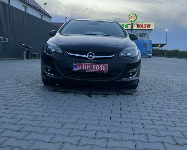 Черный Опель Астра, объемом двигателя 1.4 л и пробегом 275 тыс. км за 7500 $, фото 7 на Automoto.ua