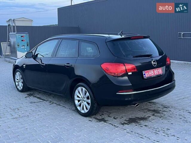 Черный Опель Астра, объемом двигателя 1.4 л и пробегом 275 тыс. км за 7500 $, фото 3 на Automoto.ua