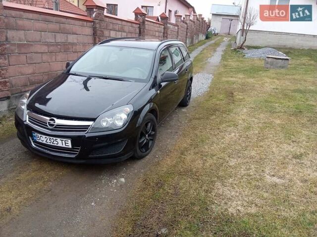 Черный Опель Астра, объемом двигателя 1.69 л и пробегом 260 тыс. км за 5600 $, фото 6 на Automoto.ua